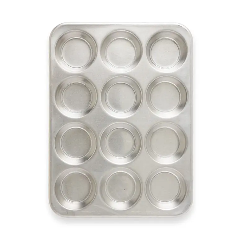 Nordicware 12-Cavity Muffin Pan With High-Domed Storage Lid 1